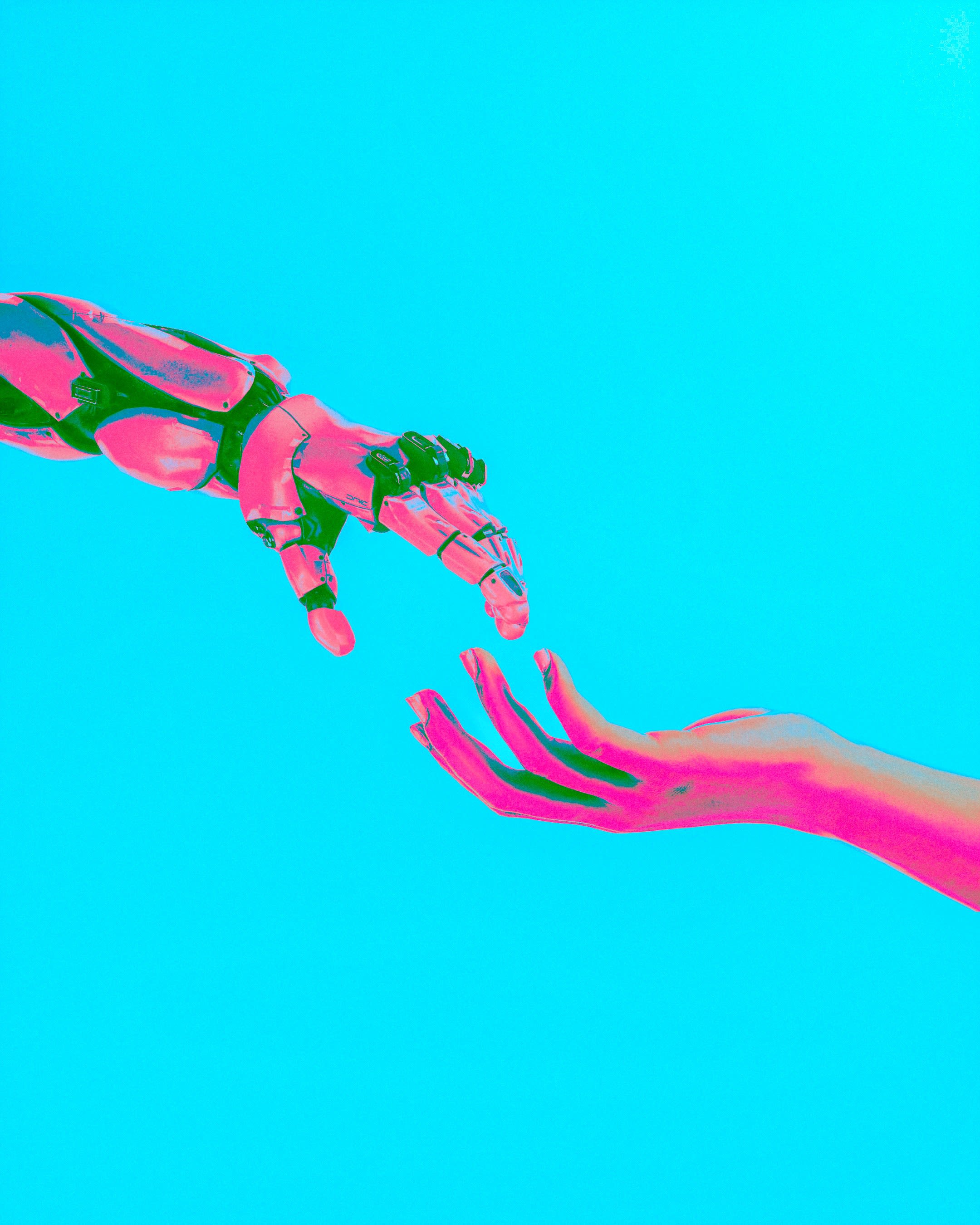 two hands reaching for a flying object in the sky